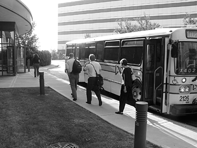 Participants in the transit benefit program at Hewitt Associates use a Pace bus to get to work in north suburban Lincolnshire.