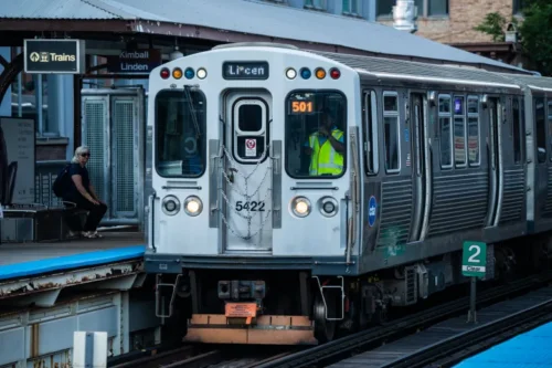 CTA purple line train arrives at a Chicago station