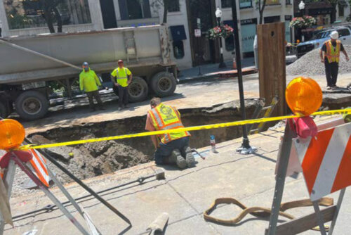 Worker views lead service line replacements